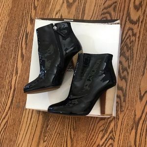 Moschino patent leather black bootie.  38 (7.5)